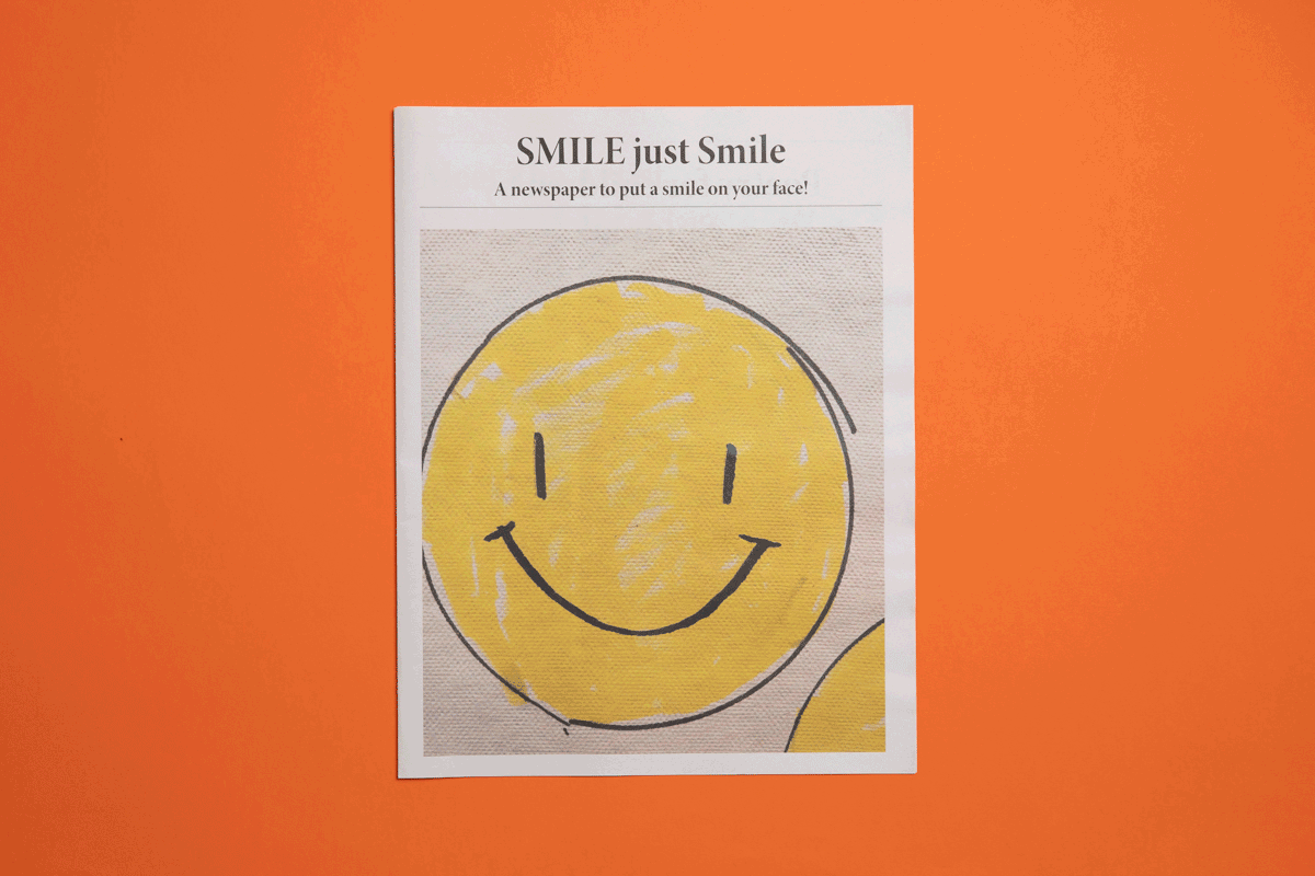 Image showing a newspaper before and after elevating it with a book underneath