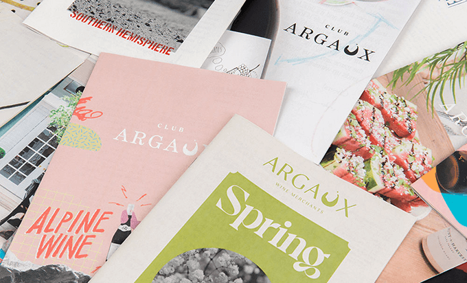 Pile of mini newspapers in pastel colours