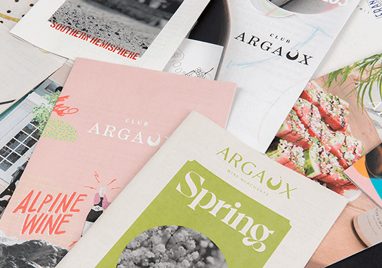 Piles of mini newspapers in pastel colours