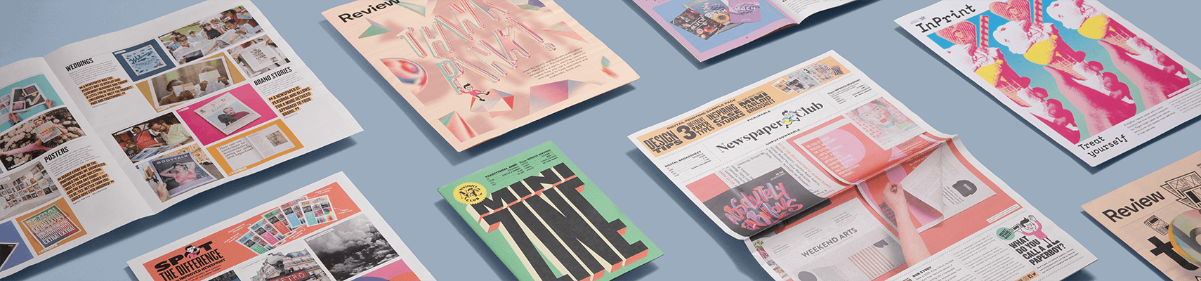 A selection of sample newspapers on a powder blue background