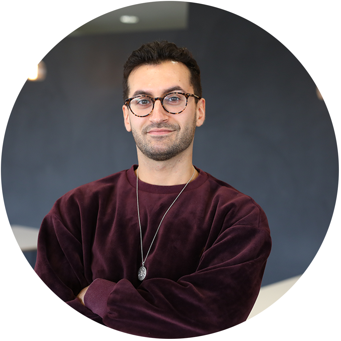 Color headshot photo of Amadeus Redha